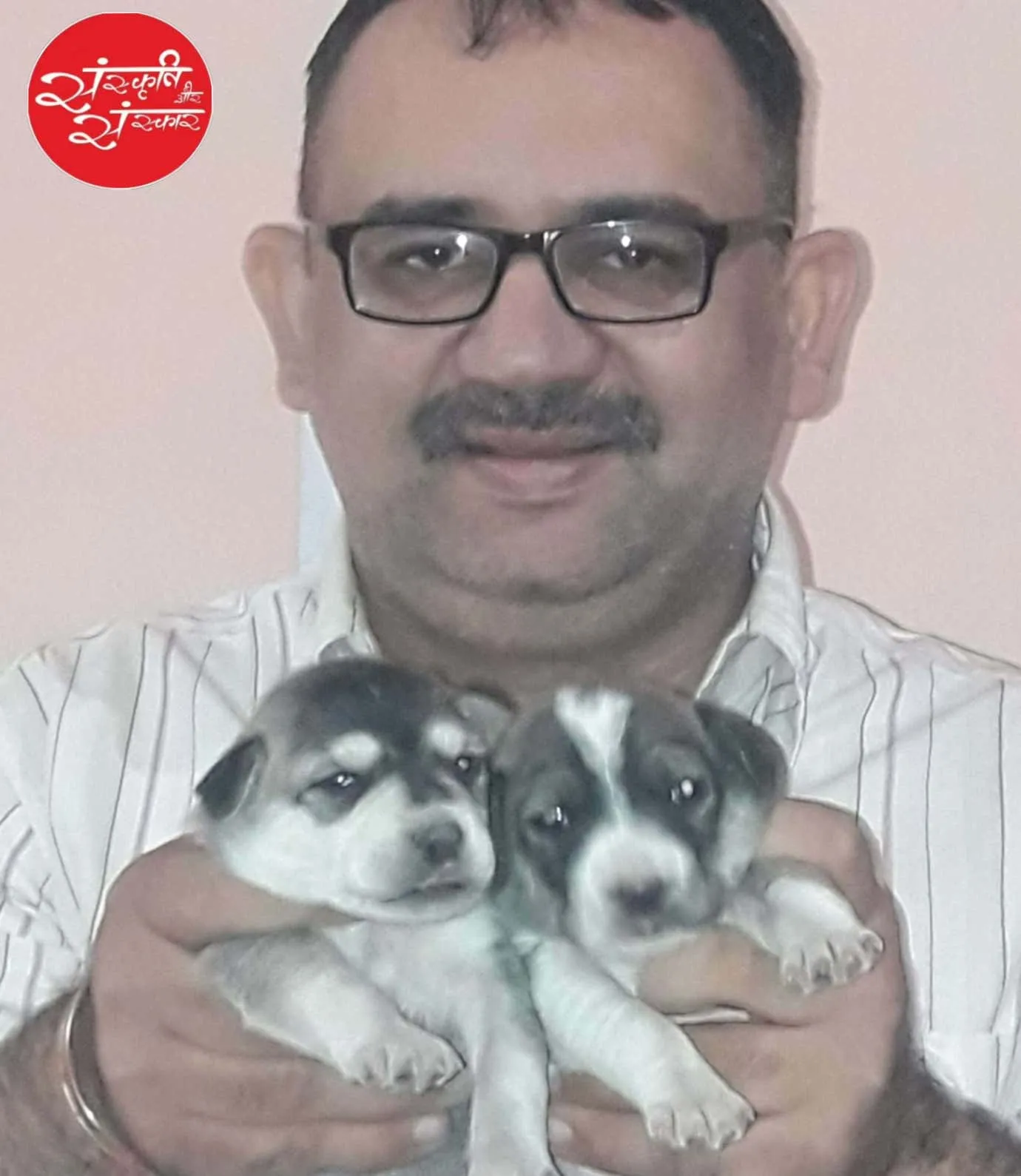 Cradling rescued puppies with care