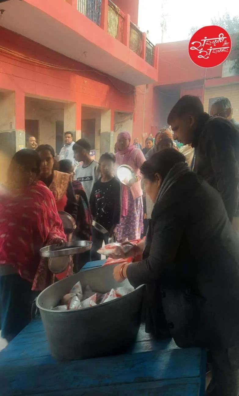 Residents gathering for their share