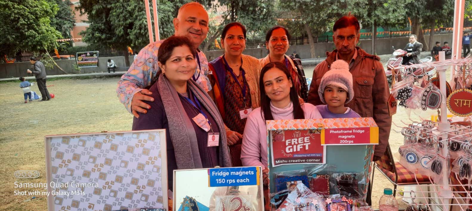 Volunteers at the Mishu creative corner stall