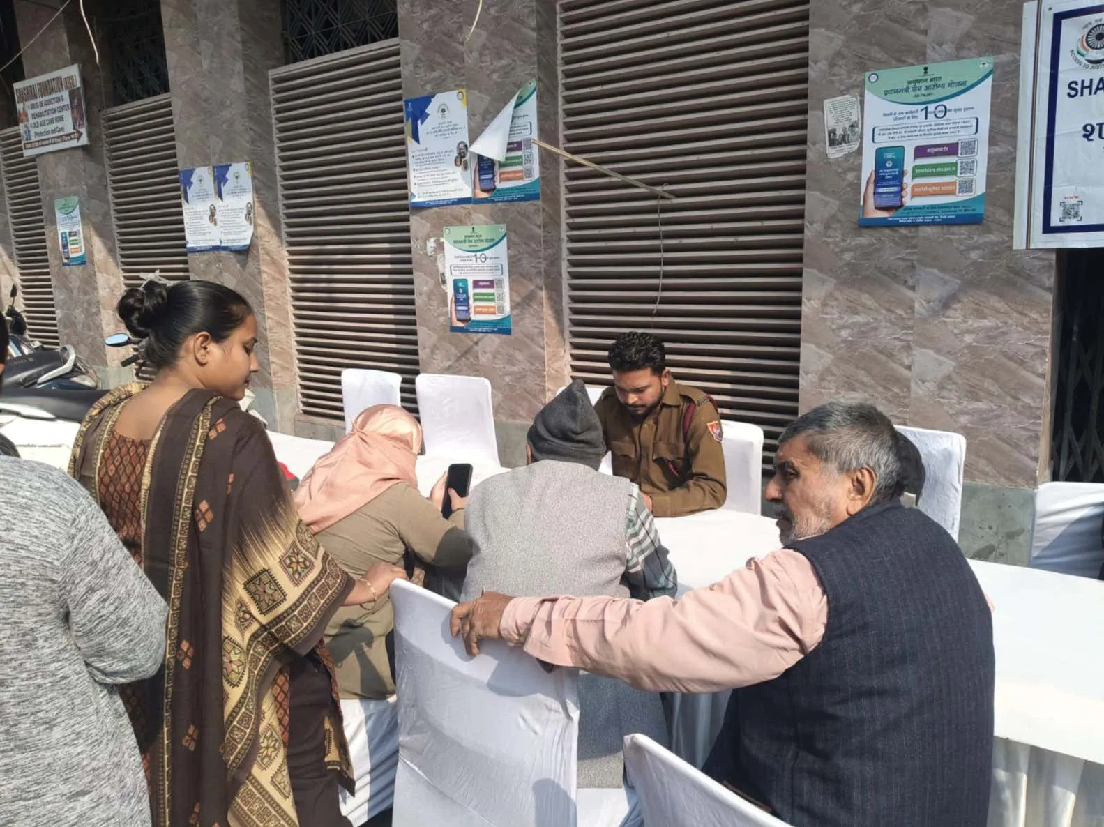 Community members receiving on-site assistance